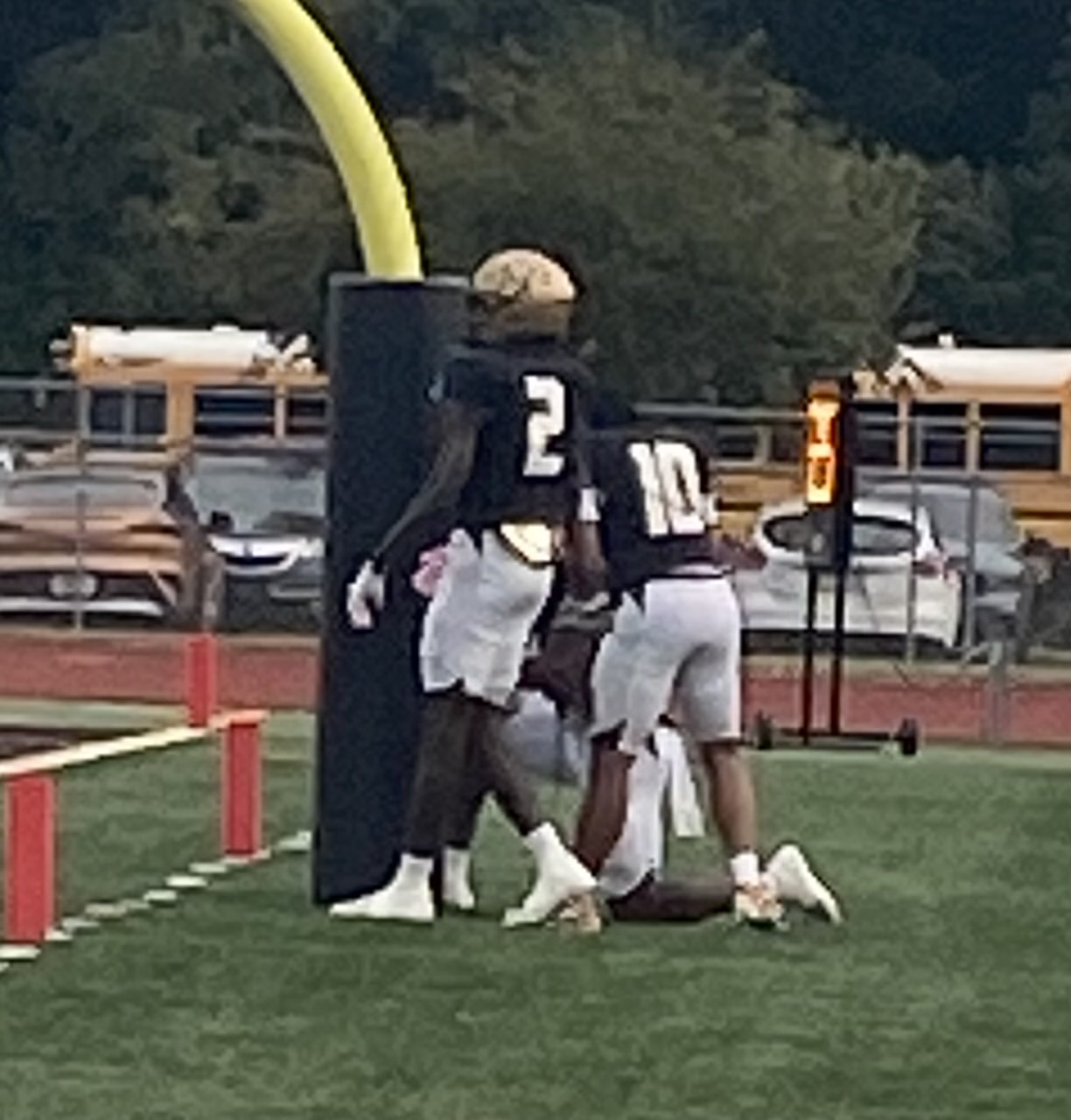 Dantae and teammates together at the goalpost before the Riverdale game