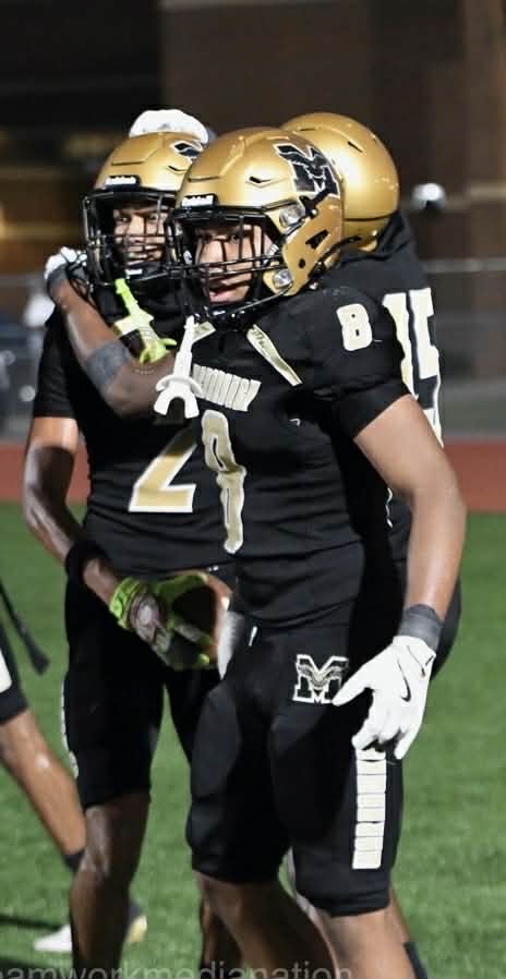 Dantae celebrating with teammates