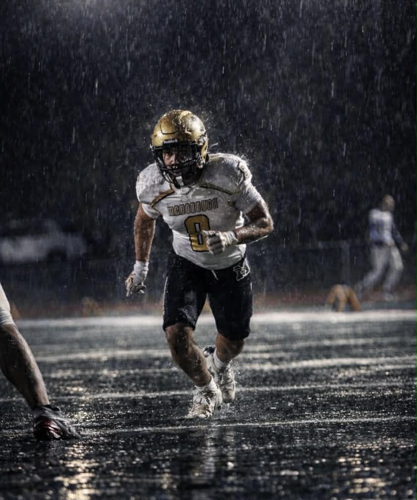 Dantae Moore Jr. playing football for McDonough High School